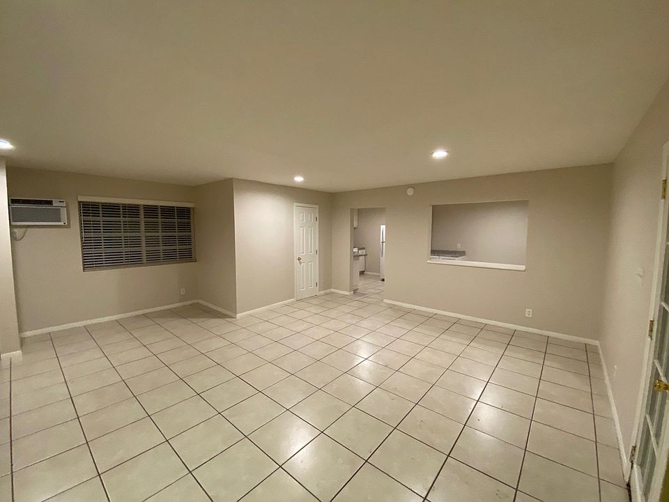 Main living space with view to Kitchen and bath