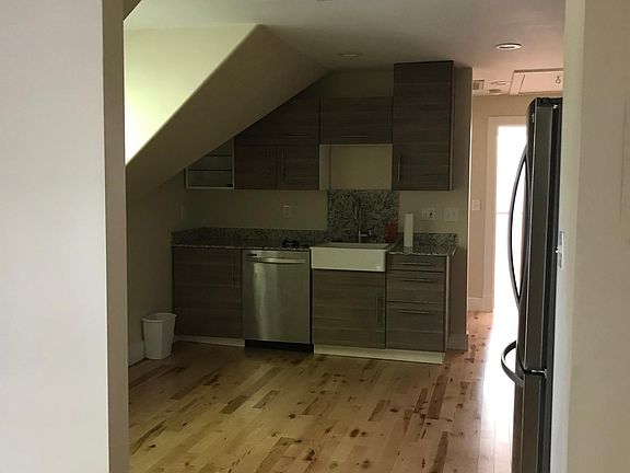 View from entry into the apartment, door beyond is the bedroom.