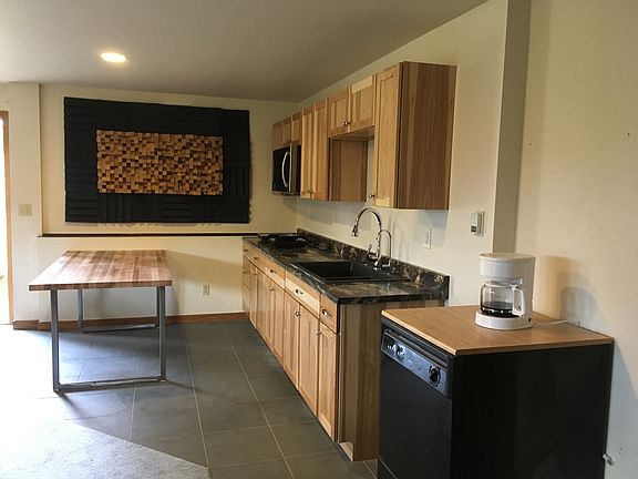 Living room/kitchenette west side