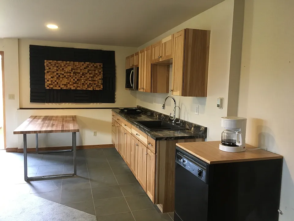 Living room/kitchenette west side