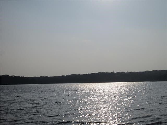 LAKE TRAVIS IS FULL! THIS PICTURE WAS TAKEN IN MARCH, 2016.......Walk to this park in minutes!