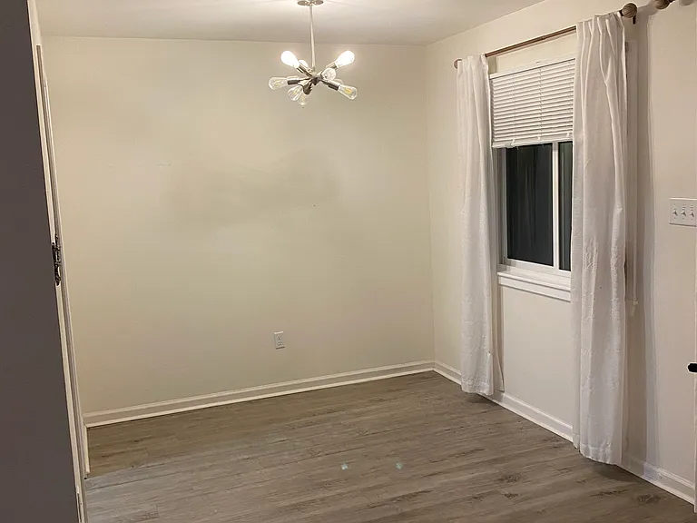 Dining room _ located off of the living room and kitchen