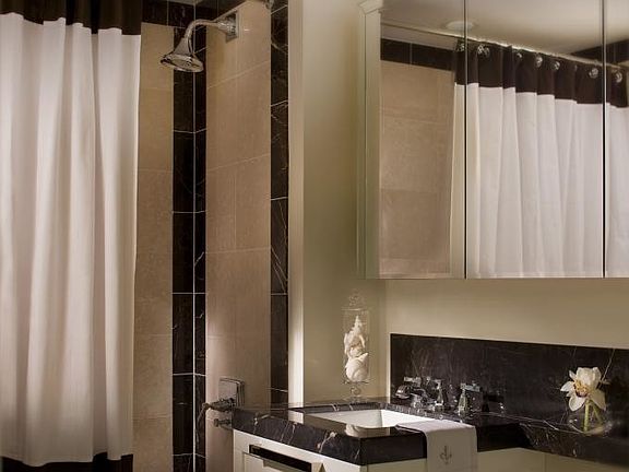 Custom bathrooms with Botticino beige marble