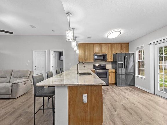 Open concept for kitchen, dining and living room