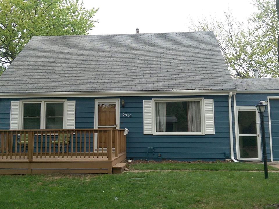 Front entrance and garage door.