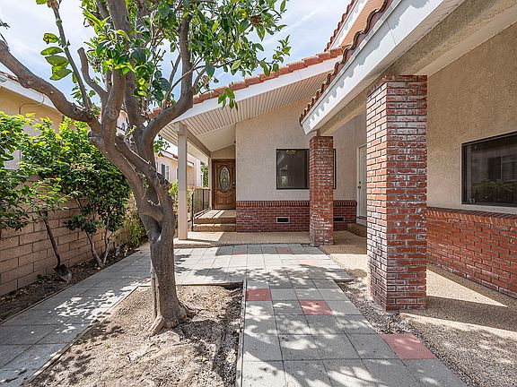 Private gated courtyard area in front yard