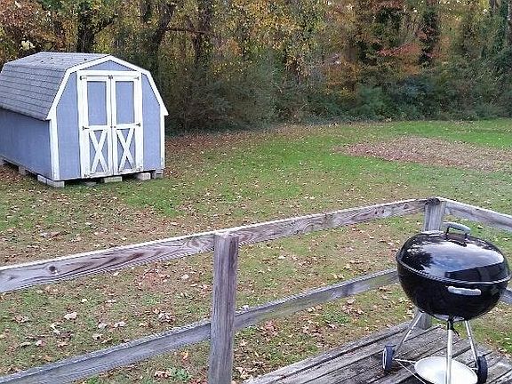 PARTIAL BACK YARD, DECK AND SHED