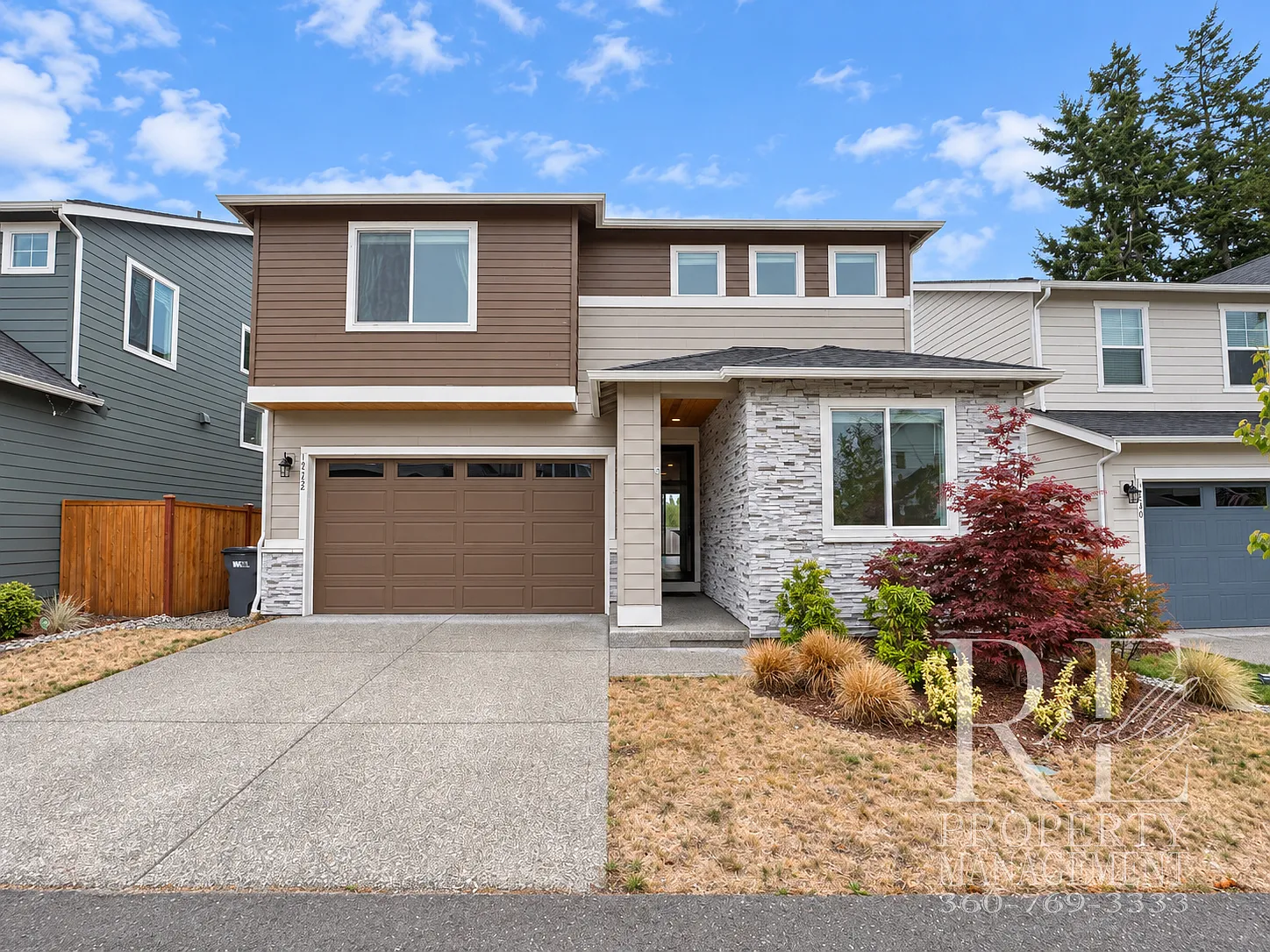 Naturally Lit 5-Bedroom Home with Fireplace, Main-Level Bedroom & Fenced Backyard — Photo 1