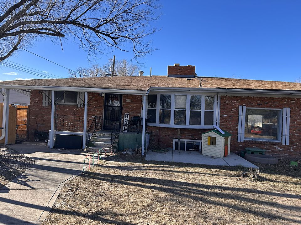 Front of House with County Living