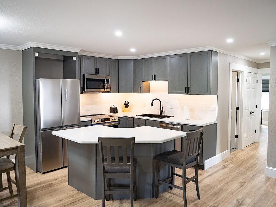 Kitchen with hallway to bathroom and bedrooms