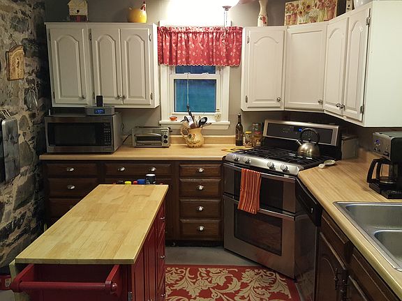 Kitchen view with mobile isl