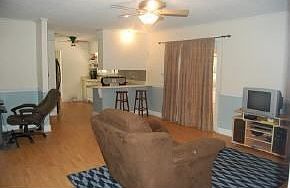 Family room to kitchen, door to laund.rm.,carport. Also access Fla.Rm, pool.