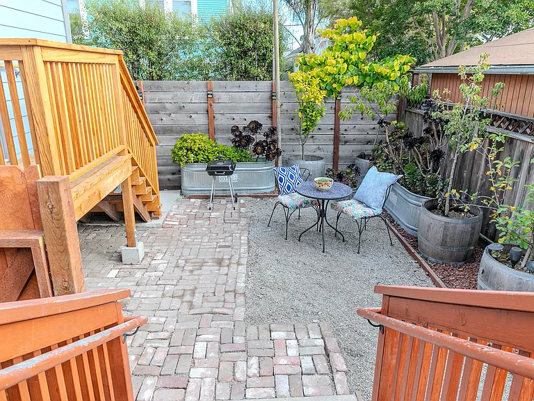 Whether you're winding down after work or working in fresh air, this backyard offers the perfect serene escape