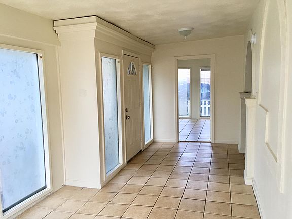 Large Sun Room across front of home