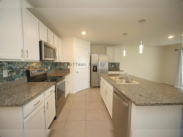 501 Calico Scallop St — Photo 4