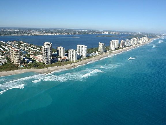 Walk over bridge to Singer Island or drive 2 minutes.