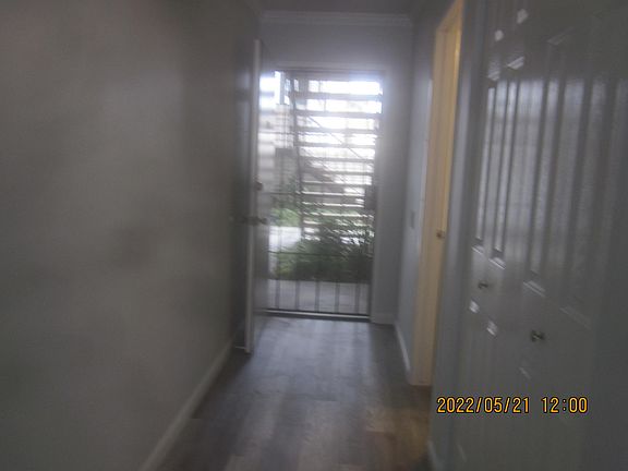 Front Security door with entrance closet on right