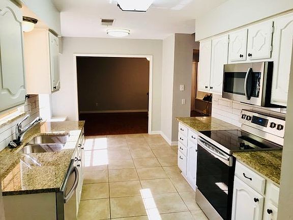 Kitchen and Breakfast Nook opens up to family room and living room.