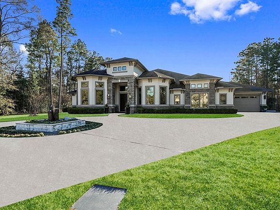 Curb appeal galore! Gated entry with circle drive and space for extra parking.