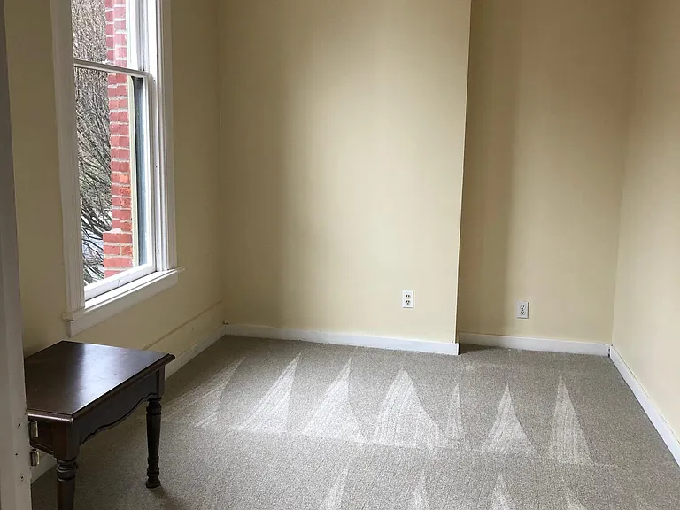 Unstaged Bedroom 1 facing Tyler St.
