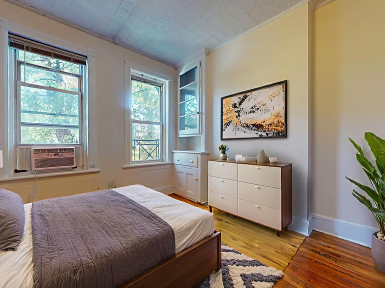 Bedroom 2 (virtually staged to show you multiple furniture layout options)