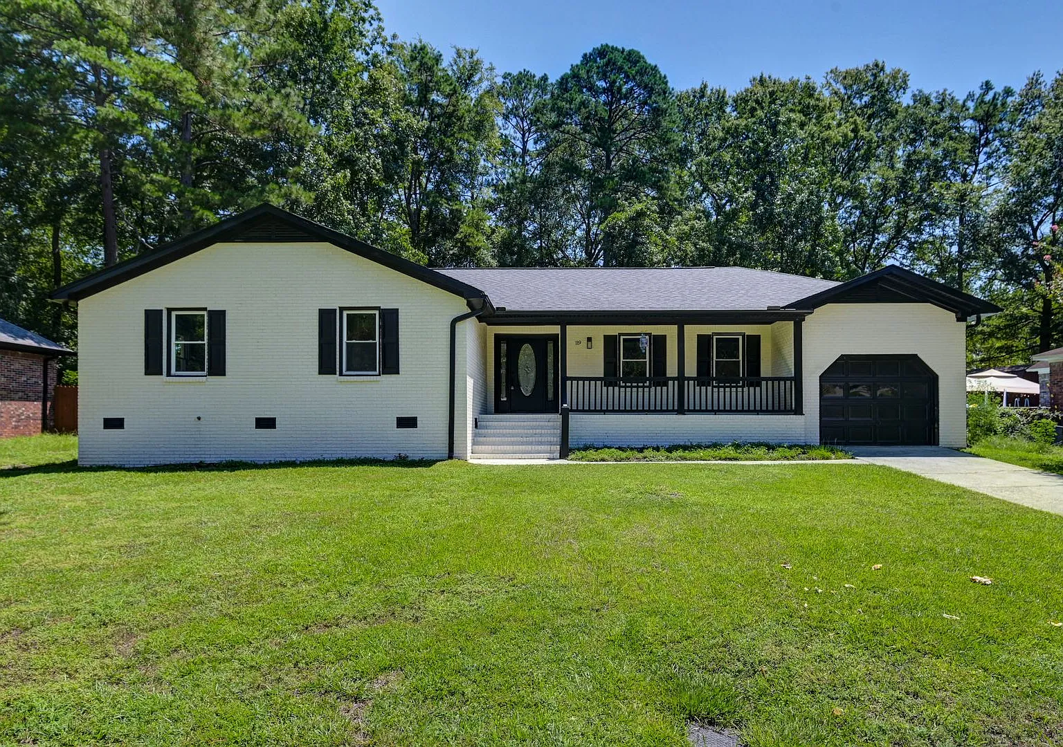 Spacious 4-Bedroom Ranch with Modern Updates & Large Fenced Yard! — Photo 1