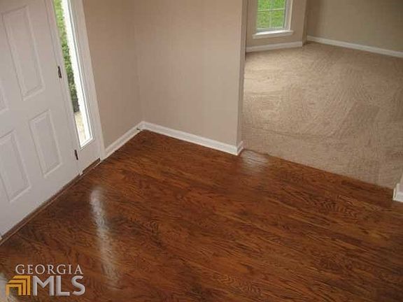 HARDWOOD FLOORS IN LARGE FOYER!