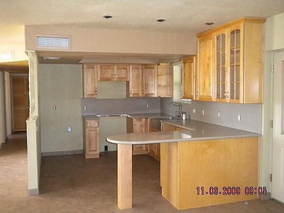 3rd image of 9824 E Des Moines St