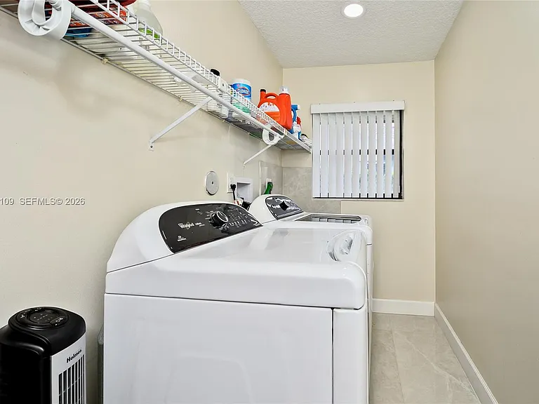 6021 NW 61st St — Photo 32