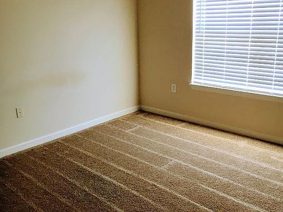 Empty bedroom - sturdy composite wood blinds