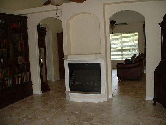 Library w/ 2 sided fireplace