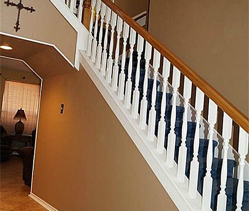 Gorgeous two story entry invites you inside