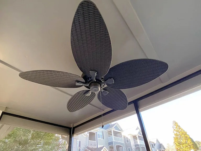 Savor soothing breezes on your screened-in patio with an outdoor ceiling fan.