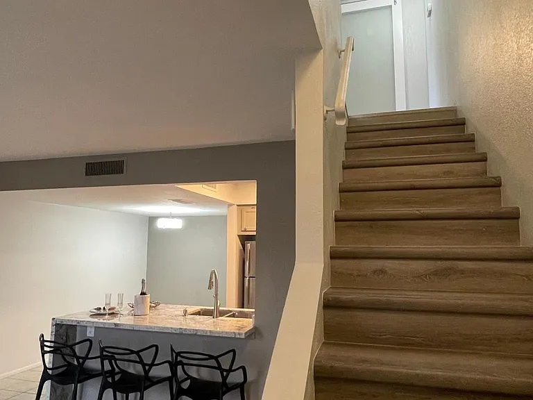 Stairway. Luxury Viny floors throughout the stairway.