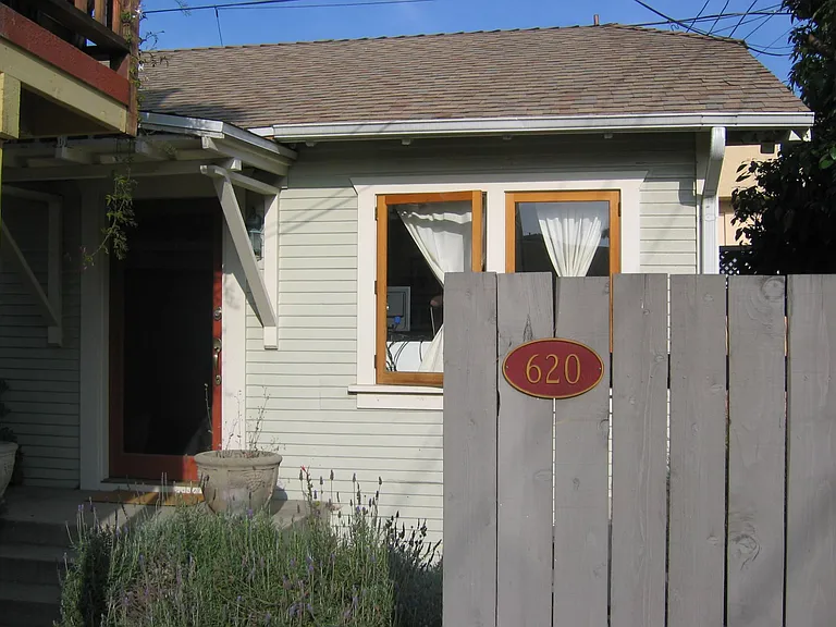 Front of the cottage has a gate (not shown here)