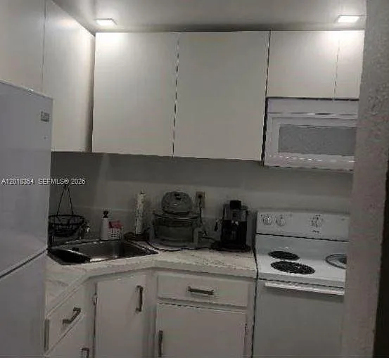 801 NW 47th Ave #916W — Photo 2