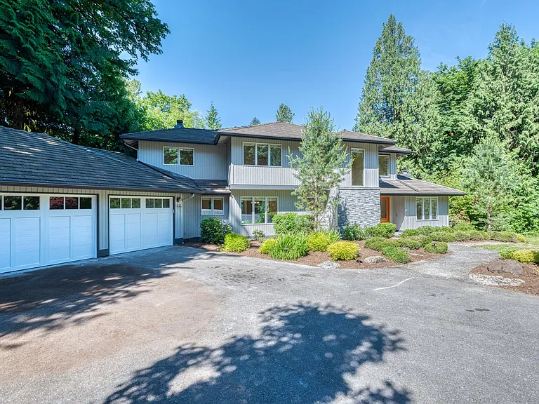 3 Car Garage and a big driveway and street parking for plenty of parking