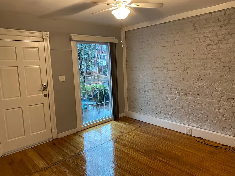 Living Room, view of Grace St. Faces south with plenty of light.