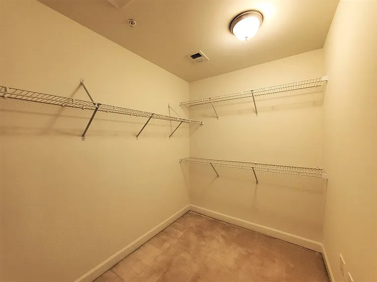 Walk In Closet - Primary Bedroom