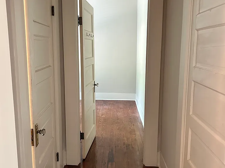 hallway to the bathroom and 8x8 small extra room