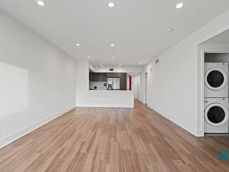 Spacious Dining and Living Room with In-Suite Washer & Dryer