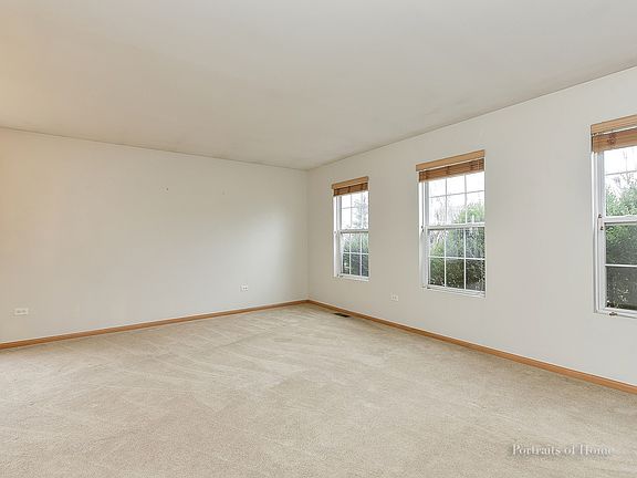 Living room ~ freshly painted with new carpet