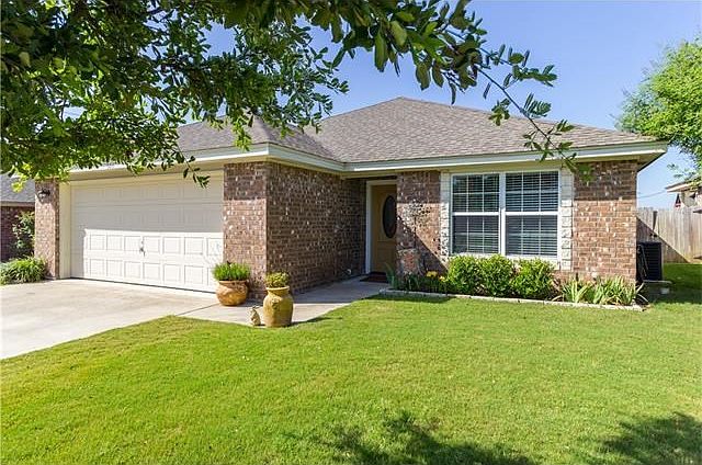 Beautiful, well maintained all side masonry home