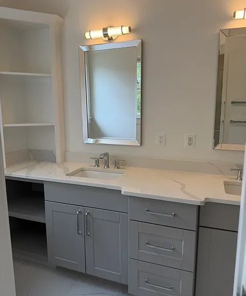 Primary ensuite bath with dual sinks...