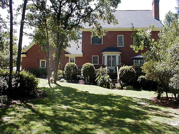 Rear view showing part of backyard