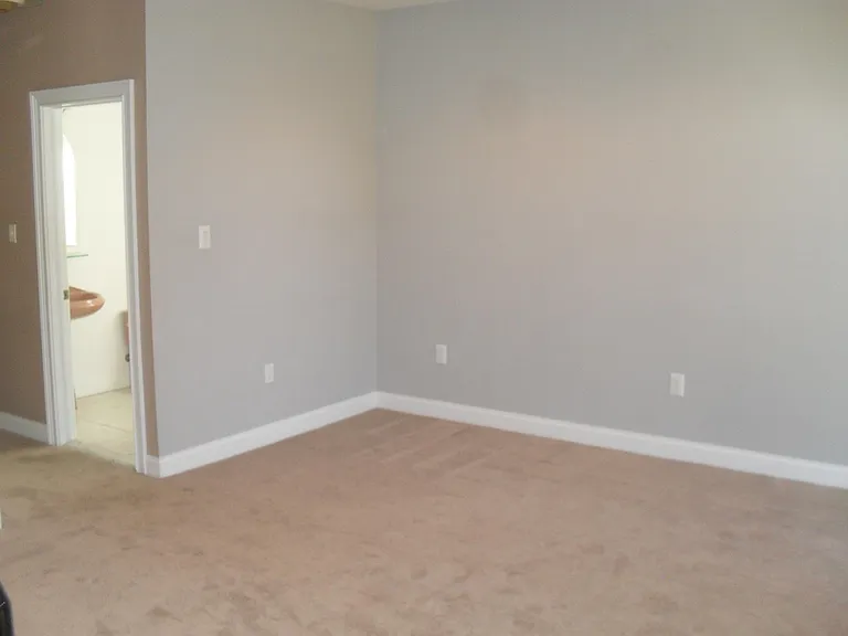 Powder room off of sitting room.