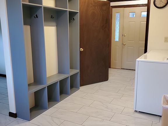 Utility room with washer and dryer hookup