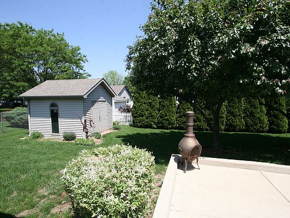 There is a Concrete Floor in the Garden Shed.  2.5 Car Heated Garage/Concrete Dr