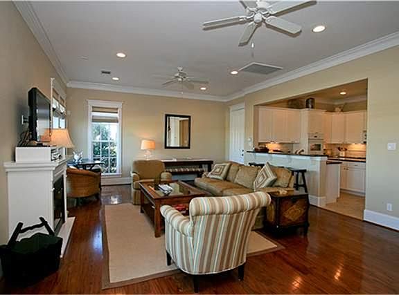 Open living and dining with hard wood floors