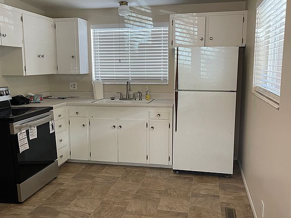 Kitchen area with New Electric Stove.